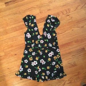 Black flower patterned romper